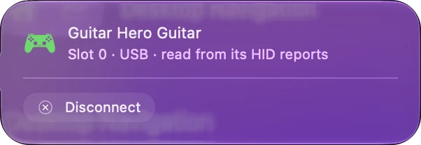 Vyskakovací okno pro kytaru Guitar Hero nahoře v postranním panelu InputConfig: Slot 0, USB, čteno z HID reportů, s tlačítkem Disconnect.